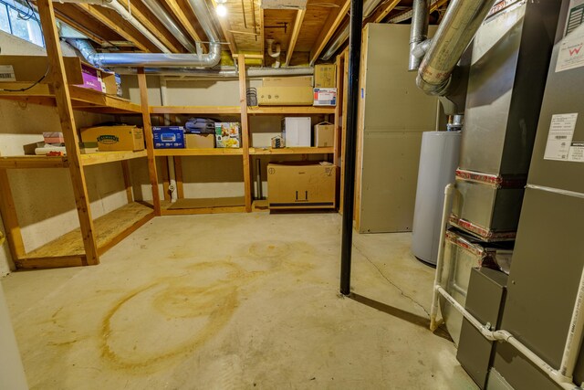 2683 Mystic Dr, Ann Arbor, MI 48103 - unfinished below grade area with heating unit and gas water heater
