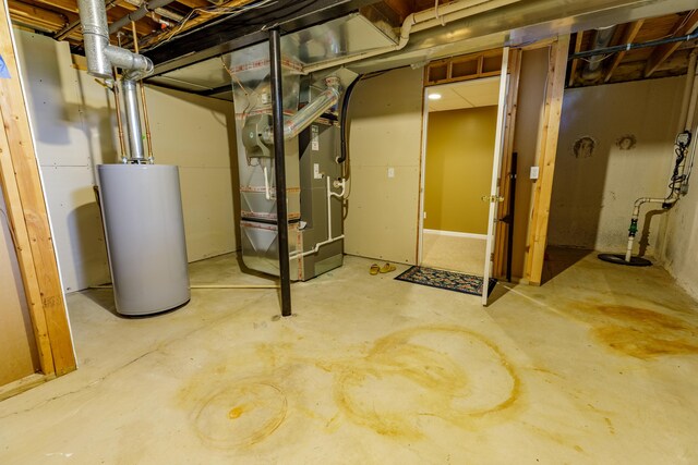 2683 Mystic Dr, Ann Arbor, MI 48103 - unfinished basement with water heater and heating unit