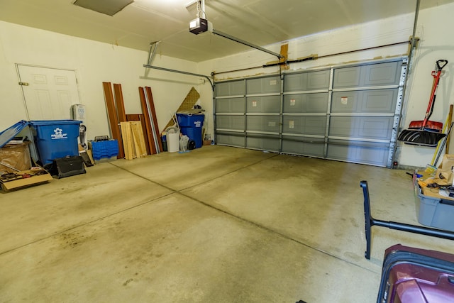 2683 Mystic Dr, Ann Arbor, MI 48103 - garage featuring a garage door opener