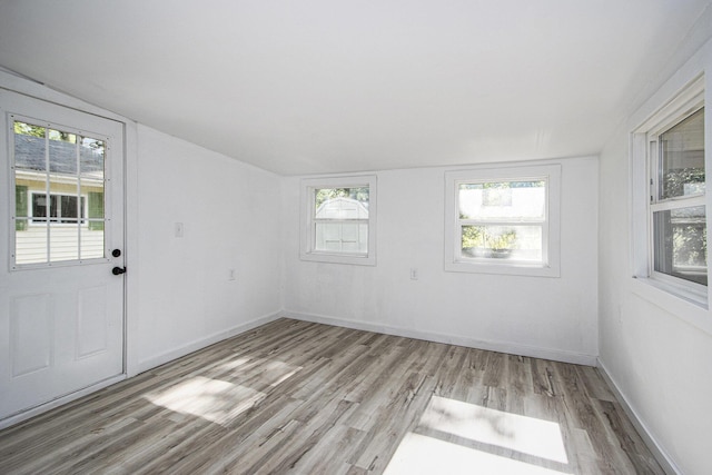 3914 Clarnin St, Kalamazoo, MI 49004 - unfurnished sunroom with vaulted ceiling