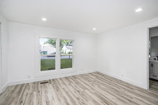 3914 Clarnin St, Kalamazoo, MI 49004 - unfurnished room featuring light wood-type flooring and recessed lighting