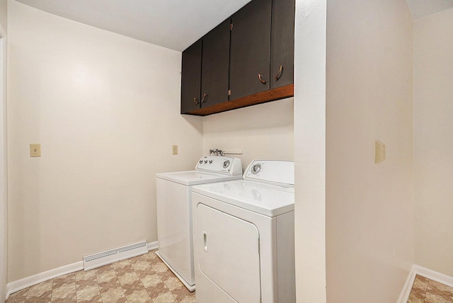 308 N Thomas St, Scottville, MI 49454 - laundry area featuring cabinet space and separate washer and dryer