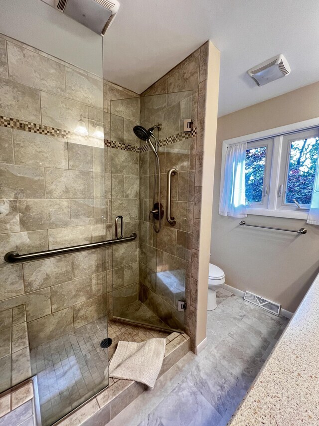 308 N Thomas St, Scottville, MI 49454 - bathroom with toilet and a stall shower