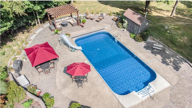 10185 N 650 E, Indiana, IN 46552 - swimming pool featuring a water slide, a pergola, and a patio