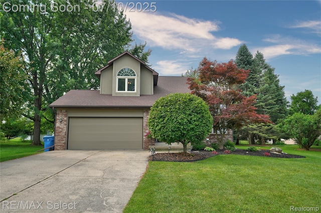 220 E Rolston Rd, Linden, MI 48451 - view of front of property with brick siding, driveway, and a front yard