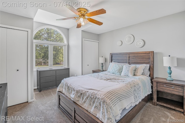 220 E Rolston Rd, Linden, MI 48451 - bedroom with carpet flooring, ceiling fan, and two closets