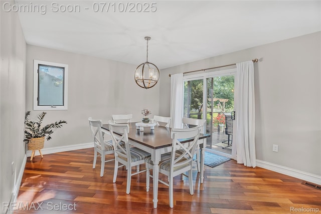 220 E Rolston Rd, Linden, MI 48451 - dining space featuring a chandelier and hardwood / wood-style flooring