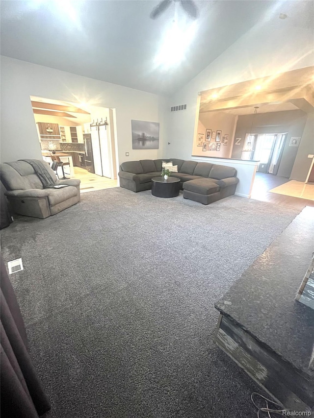 11068 Meadowview Dr, Goodrich, MI 48438 - living room with carpet flooring and vaulted ceiling