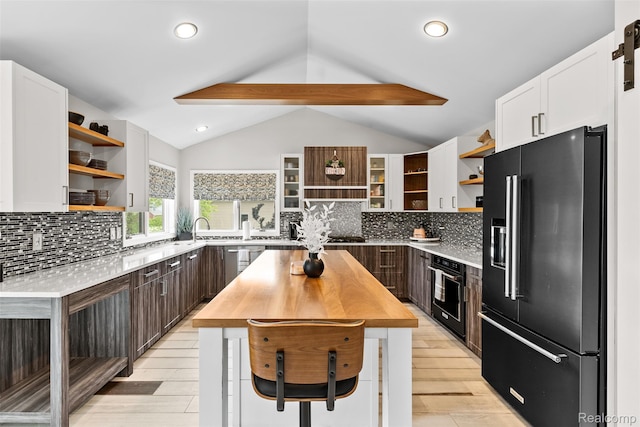 11068 Meadowview Dr, Goodrich, MI 48438 - kitchen featuring black appliances, open shelves, white cabinetry, tasteful backsplash, and recessed lighting