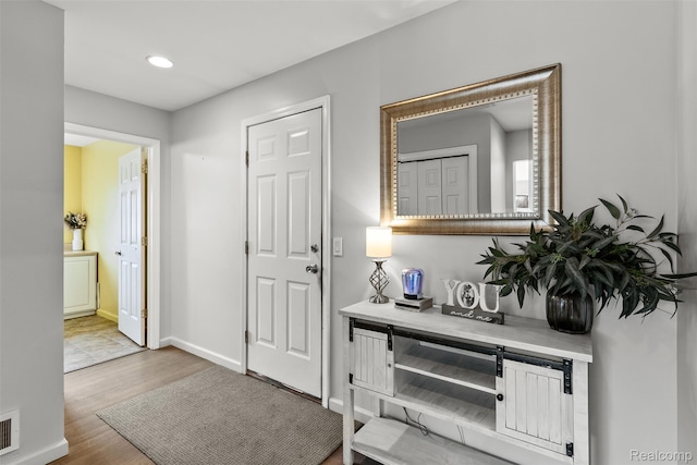 11068 Meadowview Dr, Goodrich, MI 48438 - foyer entrance with wood finished floors and recessed lighting