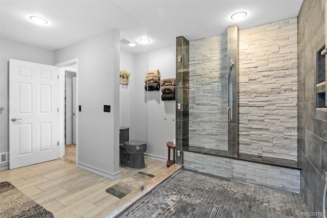 11068 Meadowview Dr, Goodrich, MI 48438 - bathroom featuring a shower stall and wood finished floors