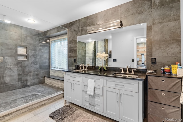 11068 Meadowview Dr, Goodrich, MI 48438 - full bathroom featuring double vanity, tile walls, and a walk in shower