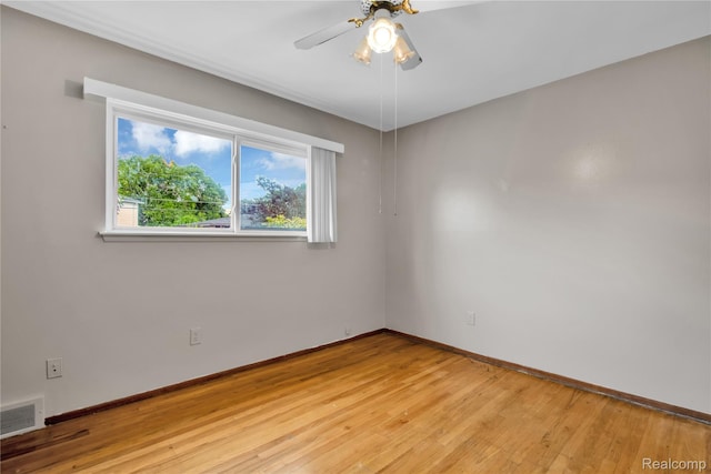 30232 Austin Dr, Warren, MI 48092 - empty room with a ceiling fan and light wood finished floors