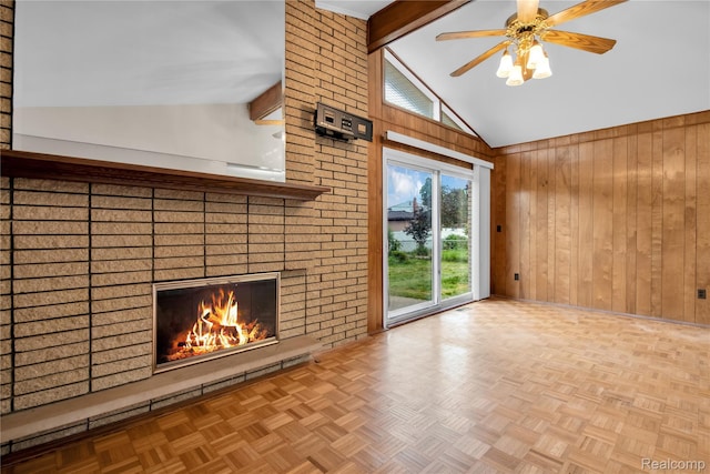 30232 Austin Dr, Warren, MI 48092 - unfurnished living room with wood walls, a ceiling fan, and a brick fireplace