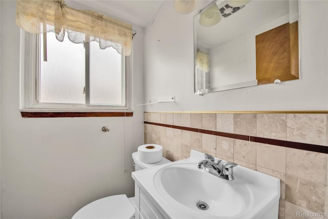 30232 Austin Dr, Warren, MI 48092 - bathroom with tile walls and vanity