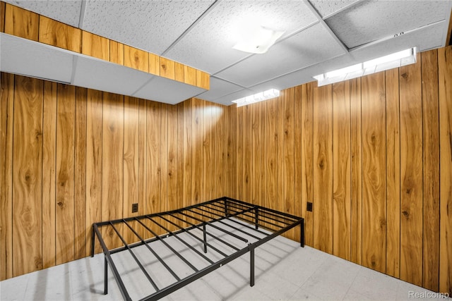 30232 Austin Dr, Warren, MI 48092 - unfurnished bedroom featuring a relaxing sauna, wooden walls, and a drop ceiling