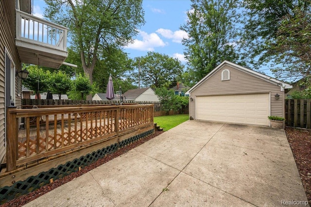 366 Marshall St, Ferndale, MI 48220 - view of patio with a detached garage, an outdoor structure, and a deck