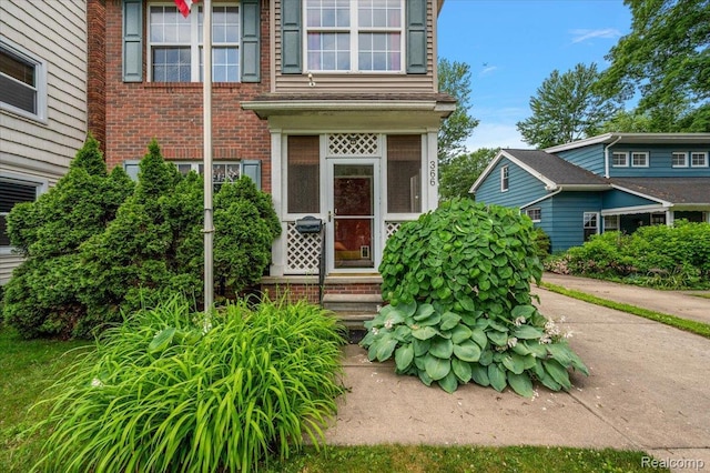 366 Marshall St, Ferndale, MI 48220 - doorway to property featuring brick siding