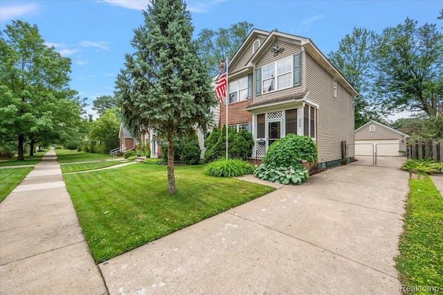 366 Marshall St, Ferndale, MI 48220 - traditional-style house featuring a detached garage and an outdoor structure