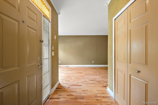 366 Marshall St, Ferndale, MI 48220 - corridor featuring light wood finished floors and ornamental molding