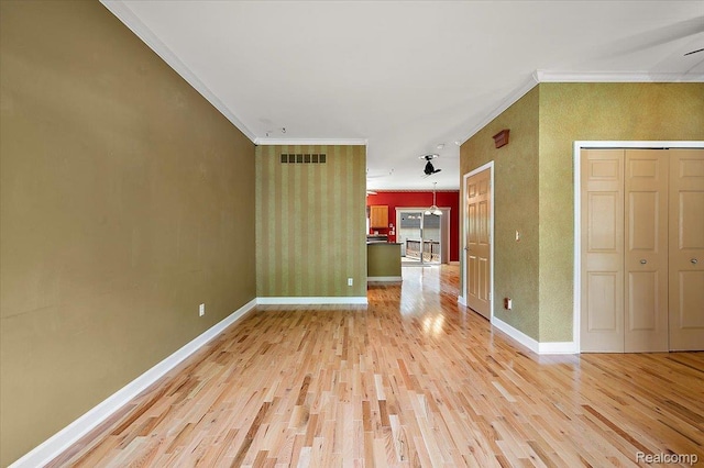 366 Marshall St, Ferndale, MI 48220 - spare room with ornamental molding and light wood finished floors