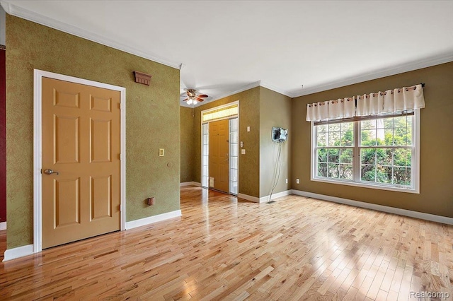 366 Marshall St, Ferndale, MI 48220 - empty room featuring ornamental molding, light wood-type flooring, and ceiling fan