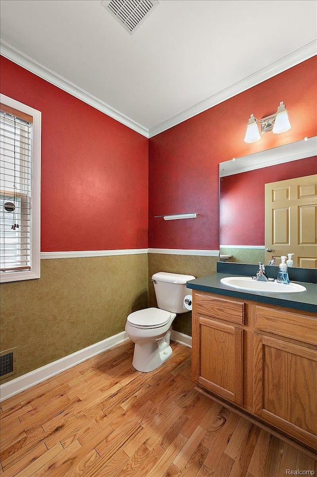 366 Marshall St, Ferndale, MI 48220 - half bath featuring wood finished floors, vanity, ornamental molding, and wainscoting