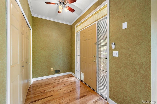 366 Marshall St, Ferndale, MI 48220 - foyer with ornamental molding, light wood finished floors, and a ceiling fan
