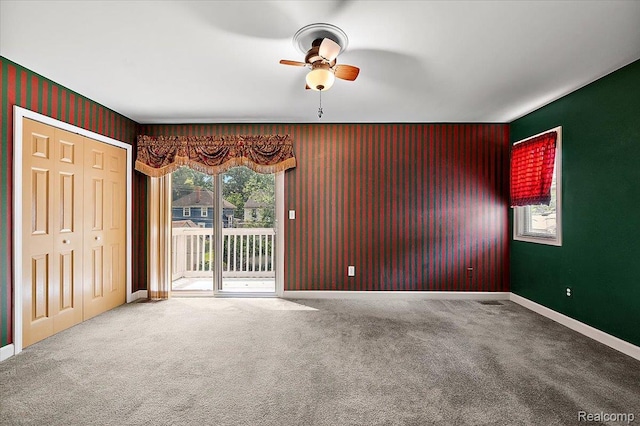 366 Marshall St, Ferndale, MI 48220 - unfurnished bedroom featuring access to exterior, carpet flooring, ceiling fan, and a closet