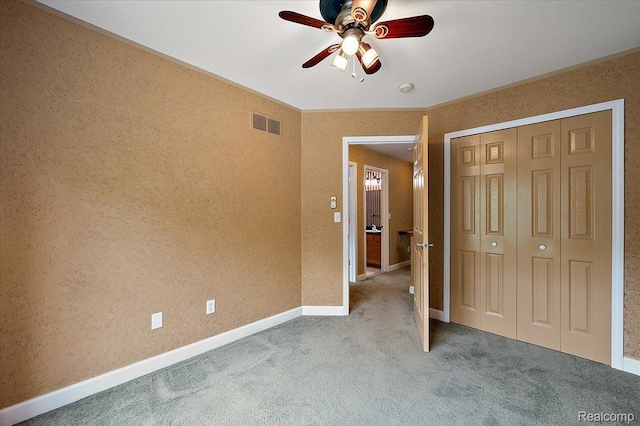 366 Marshall St, Ferndale, MI 48220 - unfurnished bedroom featuring carpet floors, a closet, and a ceiling fan
