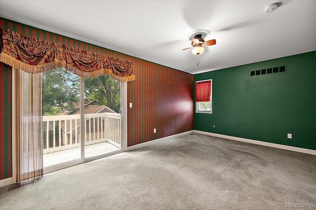 366 Marshall St, Ferndale, MI 48220 - carpeted empty room with a smoke detector, ceiling fan, and healthy amount of natural light