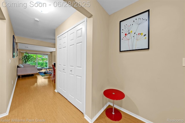 31514 Orchard Crk, Farmington Hills, MI 48334 - hall with baseboards and wood finished floors