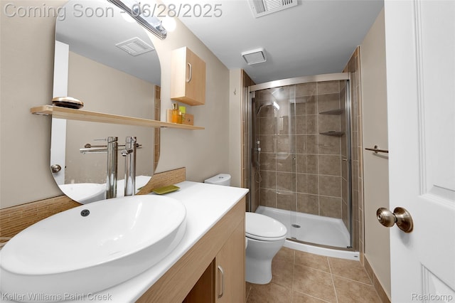 31514 Orchard Crk, Farmington Hills, MI 48334 - bathroom featuring a stall shower, vanity, and tile patterned flooring