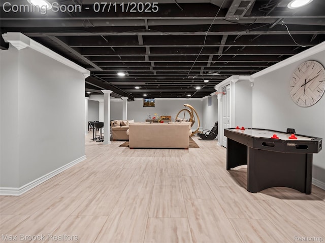 295 S Cranbrook Rd, Birmingham, MI 48009 - rec room with baseboards and wood finished floors