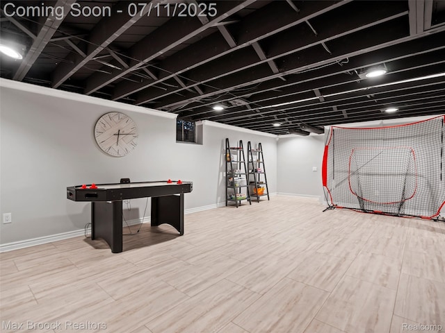 295 S Cranbrook Rd, Birmingham, MI 48009 - game room with baseboards and wood finished floors