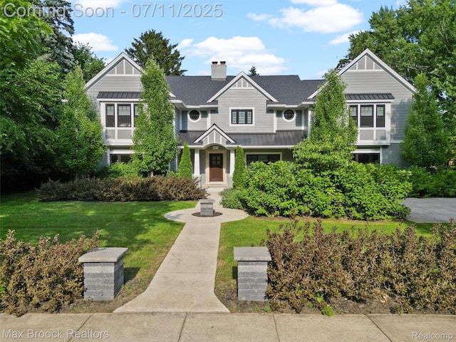 295 S Cranbrook Rd, Birmingham, MI 48009 - craftsman inspired home with a standing seam roof, a metal roof, a front yard, and roof with shingles