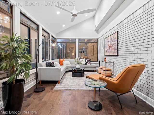295 S Cranbrook Rd, Birmingham, MI 48009 - living room with lofted ceiling, wood-type flooring, ceiling fan, recessed lighting, and brick wall