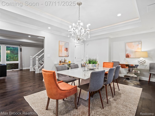 295 S Cranbrook Rd, Birmingham, MI 48009 - dining area featuring stairs, a tray ceiling, dark wood-style flooring, recessed lighting, and a chandelier