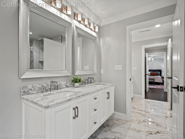 295 S Cranbrook Rd, Birmingham, MI 48009 - ensuite bathroom with marble finish floors, double vanity, ornamental molding, and a marble finish shower