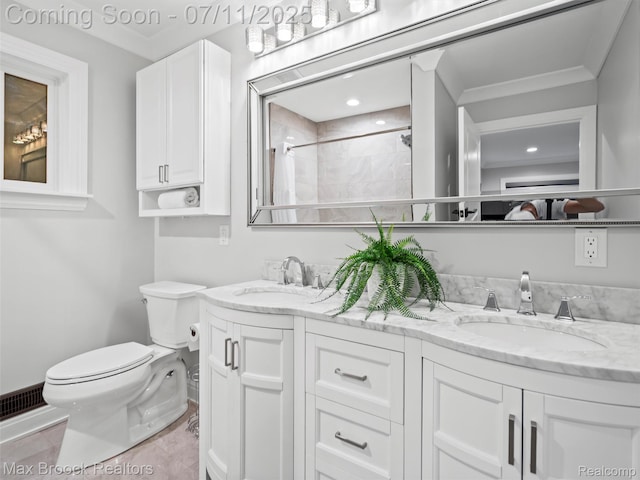 295 S Cranbrook Rd, Birmingham, MI 48009 - bathroom with double vanity, crown molding, and tiled shower