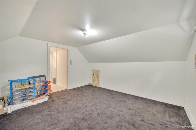 1232 N Saginaw St, Lapeer, MI 48446 - bonus room featuring lofted ceiling and carpet