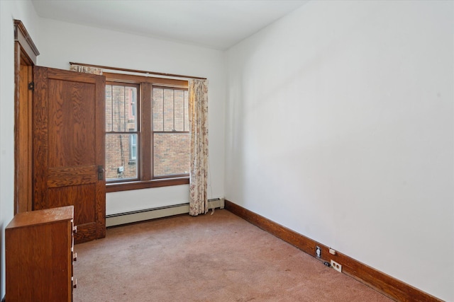 418 Main St, Battle Creek, MI 49014 - empty room with carpet and baseboard heating