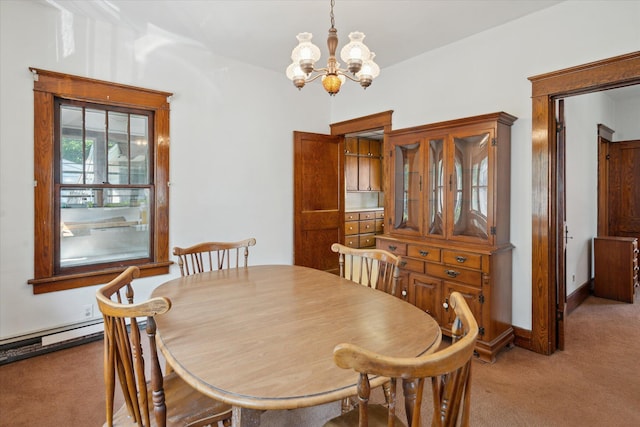 418 Main St, Battle Creek, MI 49014 - dining space with a chandelier, light colored carpet, and a baseboard radiator