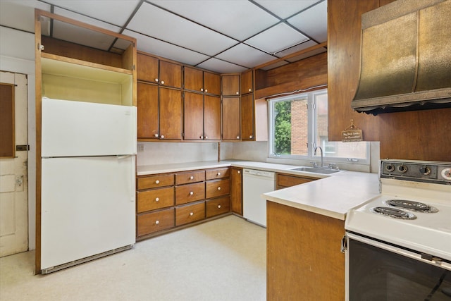 418 Main St, Battle Creek, MI 49014 - kitchen featuring white appliances, brown cabinetry, light countertops, ventilation hood, and a drop ceiling