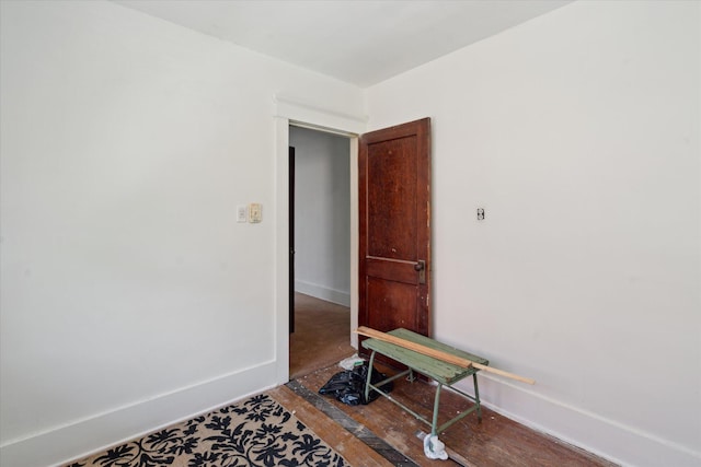418 Main St, Battle Creek, MI 49014 - spare room featuring baseboards