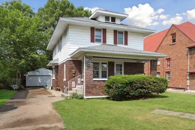 418 Main St, Battle Creek, MI 49014 - american foursquare style home featuring an outdoor structure, a garage, brick siding, a front lawn, and a shingled roof