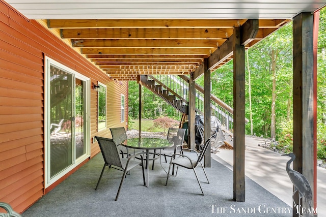 17952 Spring Tree Ct, Spring Lake, MI 49456 - view of patio / terrace with stairway and outdoor dining area