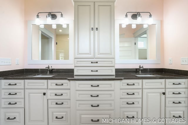 4401 Grand Pt, Holland, MI 49424 - bathroom with double vanity