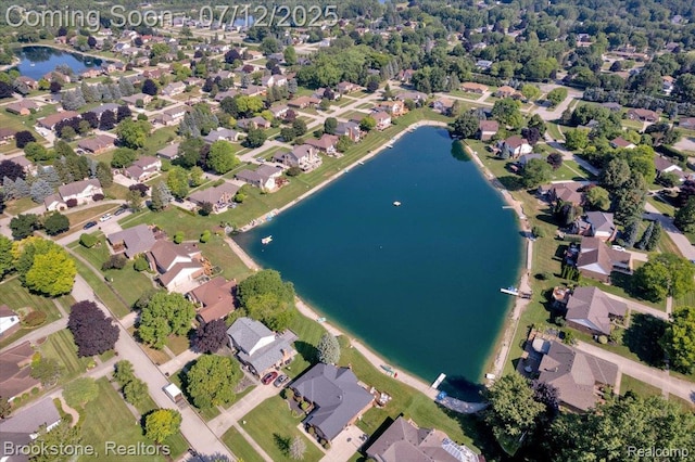 46655 Spruce Dr, Shelby Twp, MI 48315 - aerial overview of property's location featuring a nearby body of water and nearby suburban area