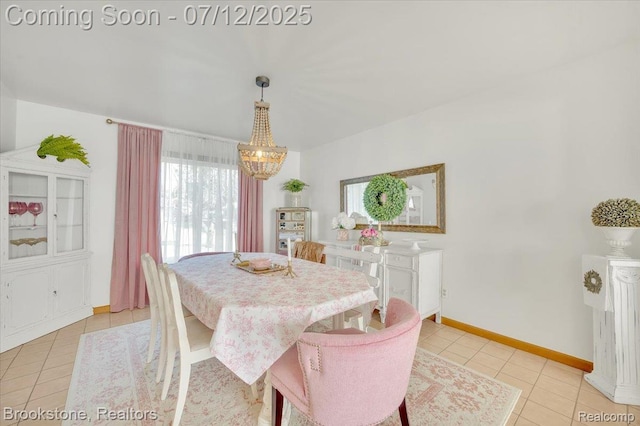 46655 Spruce Dr, Shelby Twp, MI 48315 - dining room featuring light tile patterned floors and a chandelier